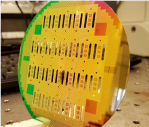 Through wafer holes created using deep reactive ion etching of silicon